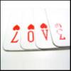 love spelled out by playing cards