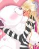 cute blonde girl hugging her teddy bear