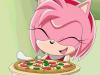 Amy holding a pizza